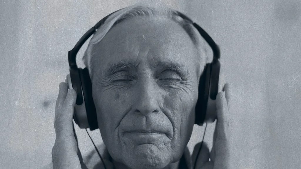 Senior man wearing headphones